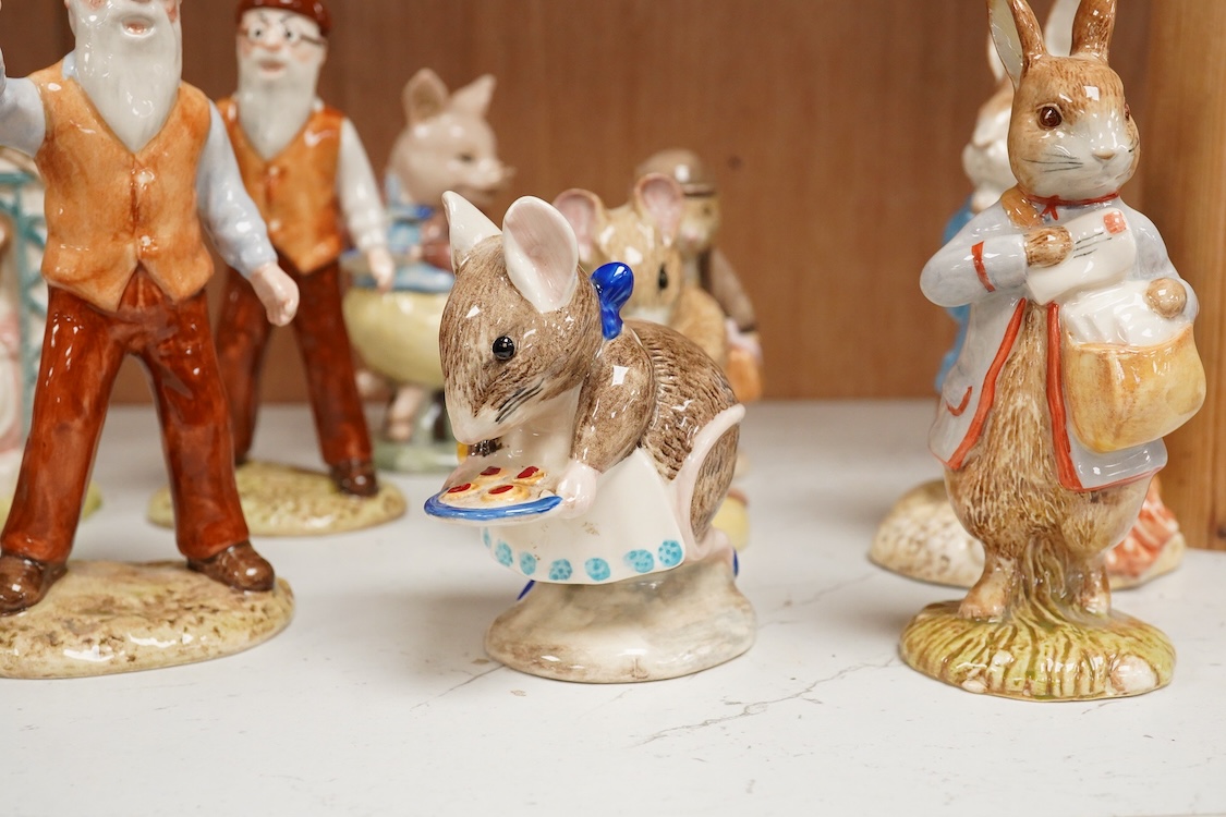 A collection of eighteen mixed Royal Doulton and Royal Albert figures of Beatrix Potter characters, largest 13cm high